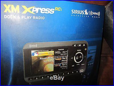XM EXPRESS, SIRIUS, DOCK AND PLAY CAR RADIO WITH CARRY ANYWHERE ALTEC LANSING DO